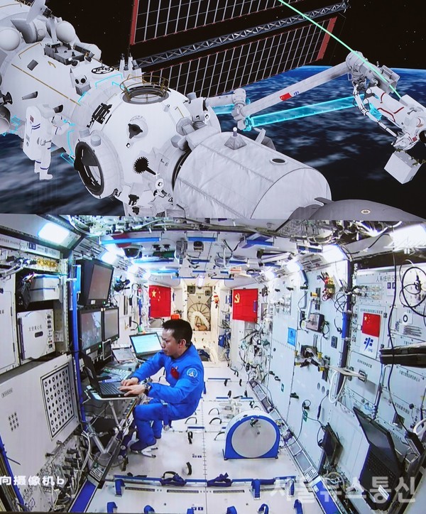 중국 유인우주선 선저우(神舟) 12호에 탑승한 두 명의 우주인이 20일 우주선 모듈 밖에서 작업을 수행 / 사진=신화통신